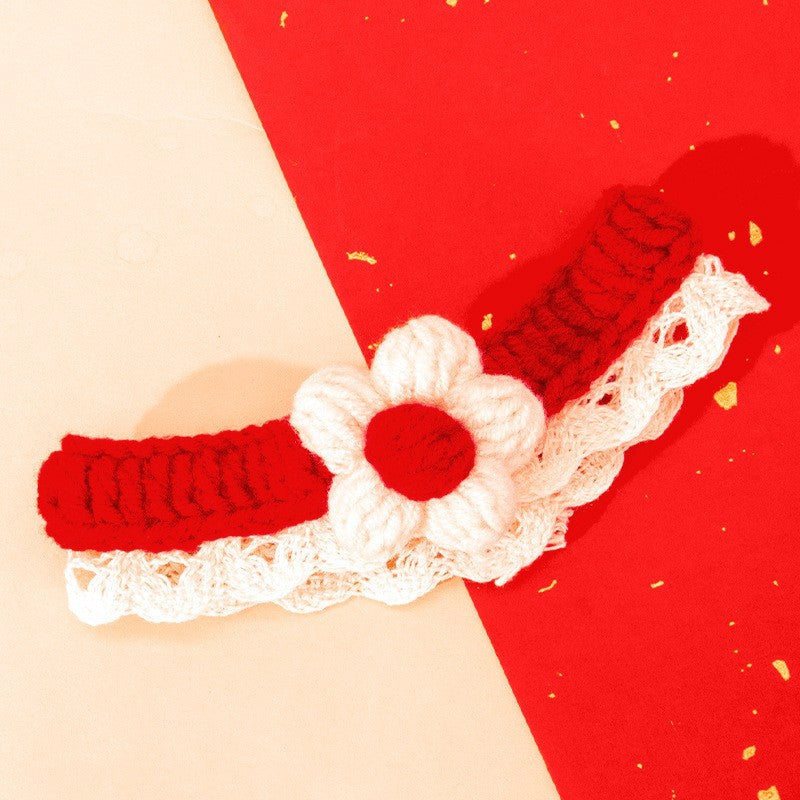 Knitted pet bandana with festive patterns