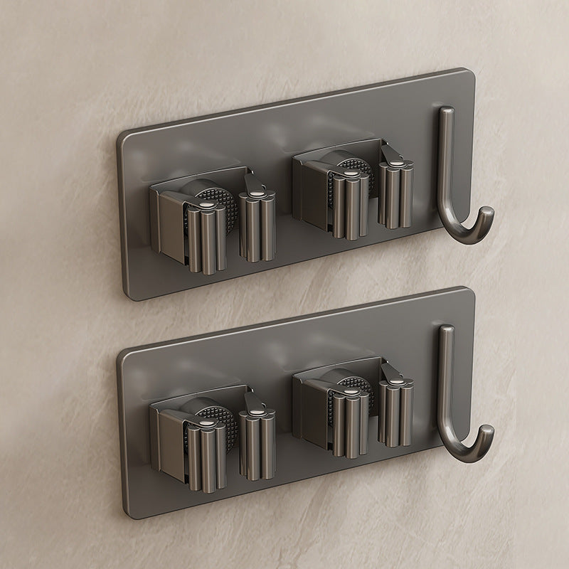 Stainless steel holder for mop and broom