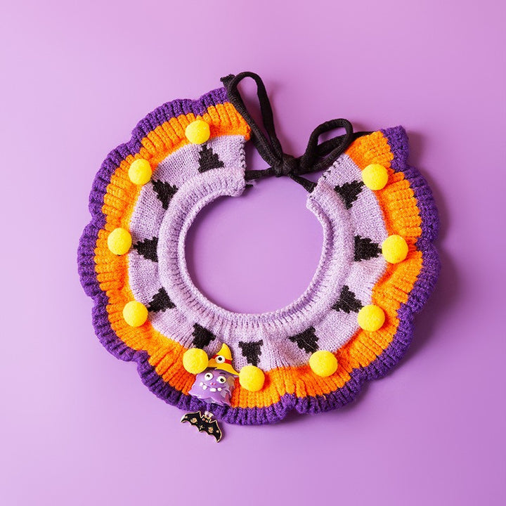 Knitted pet bandana with festive patterns