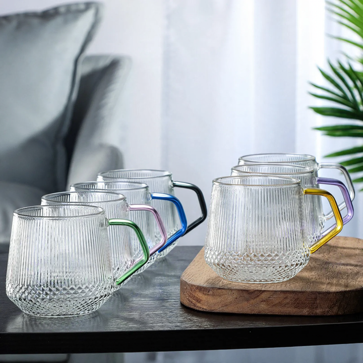 Glass drinking cup with straw