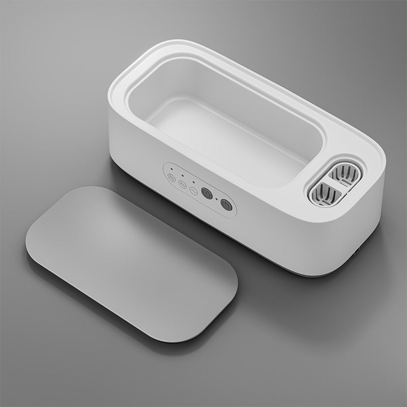 Ultrasonic eyeglass cleaner with double chamber