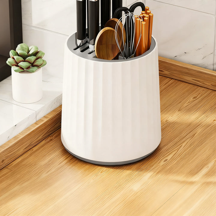 Rotating knife holder with cutlery compartment