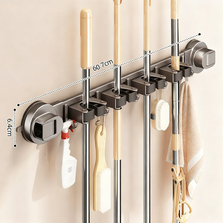 Suction cup holder for brooms and cleaning tools
