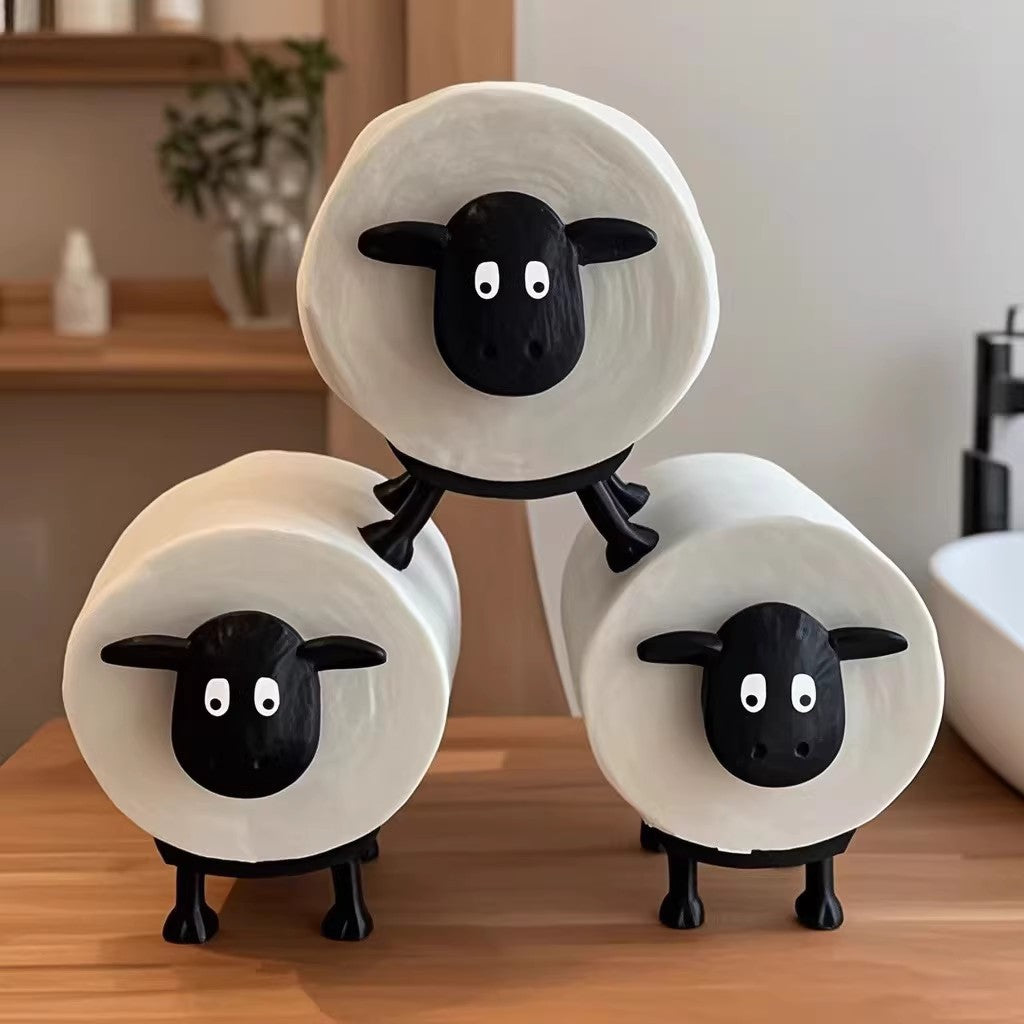 Toilet paper holder made of synthetic resin, sheep design