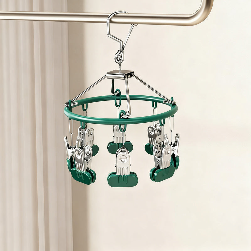 Clothes drying rack with clips