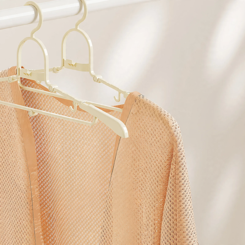 Foldable clothes hanger, portable and space-saving