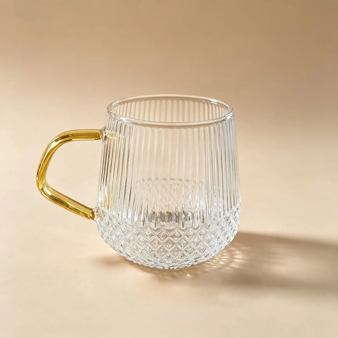 Glass drinking cup with straw