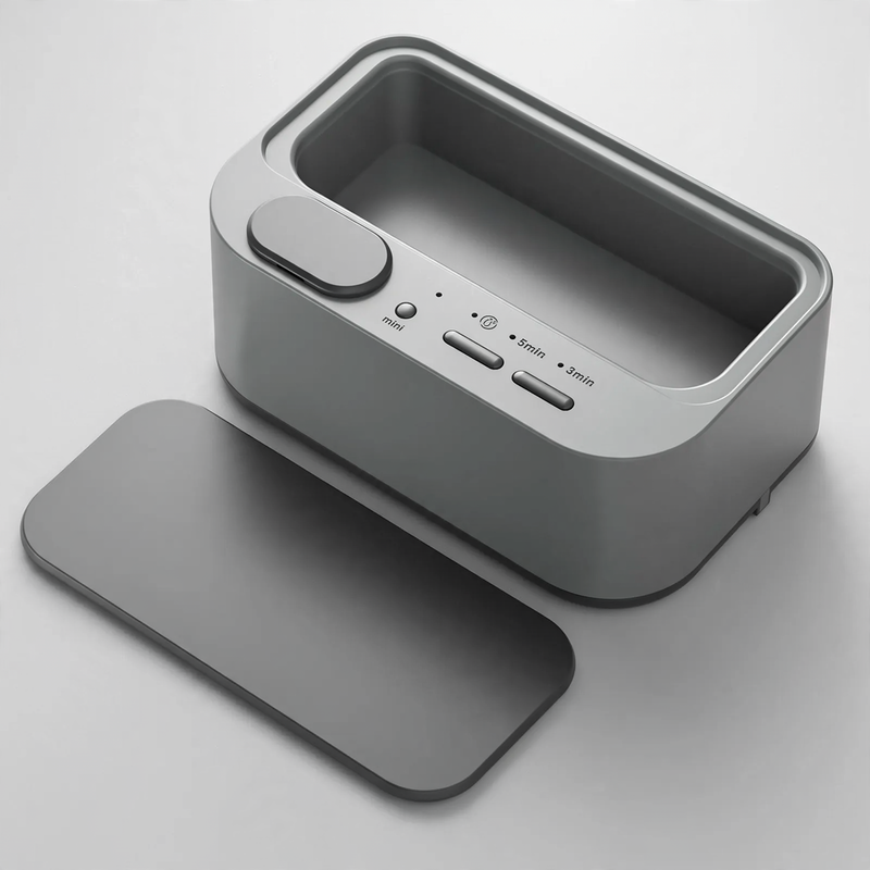 Double chamber ultrasonic cleaning device