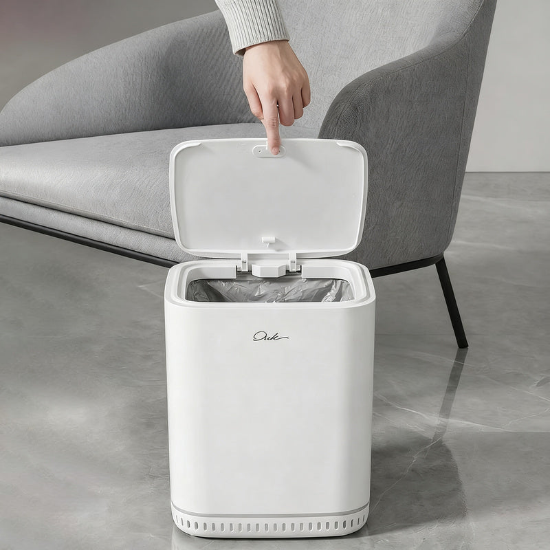 Trash can with lid and automatic bag holder
