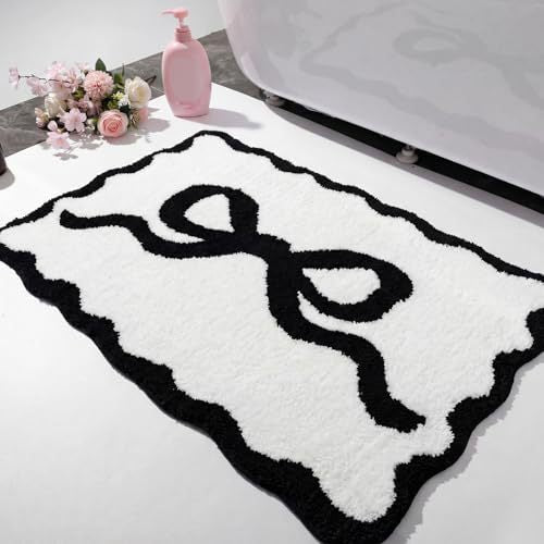 Bath mat with bow motif, synthetic fiber fabric