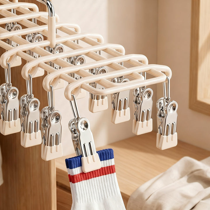 Stainless steel laundry rack with multiple clips