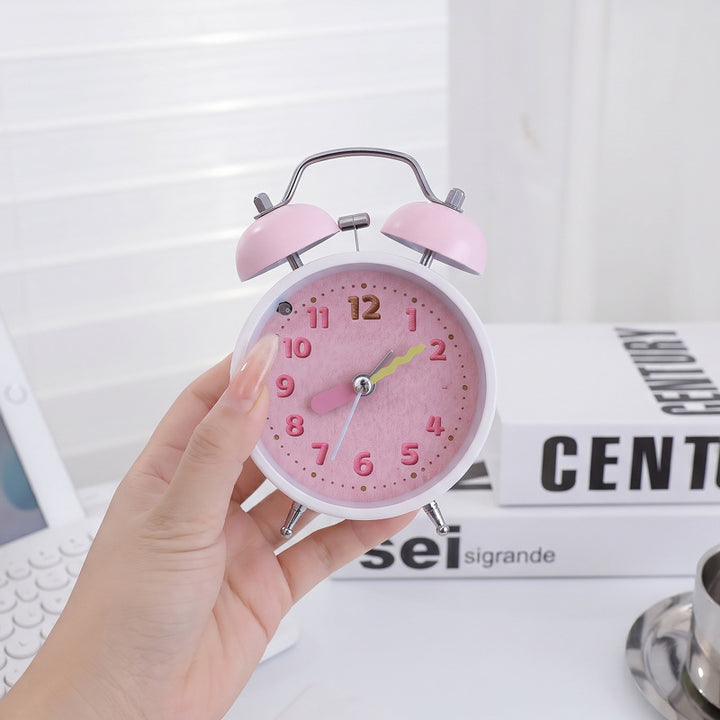 Metal alarm clock with bell, hands, and battery operation