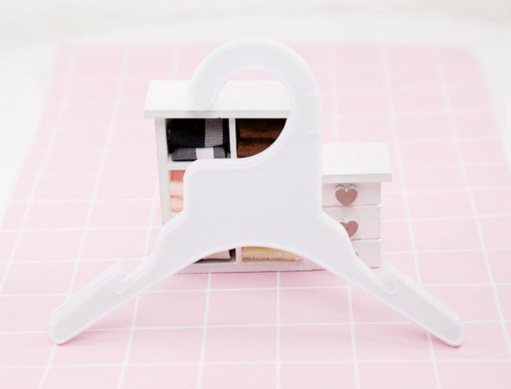 Plastic hanger for pet clothing