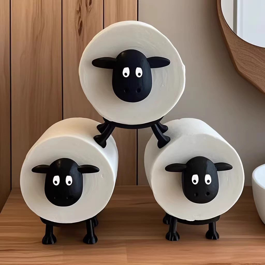 Toilet paper holder made of synthetic resin, sheep design