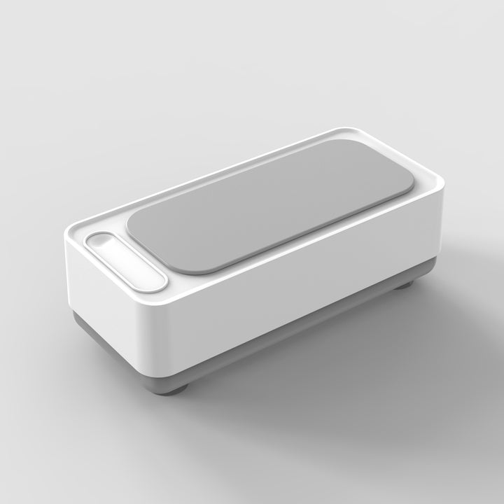 Ultrasonic cleaning device with stainless steel housing