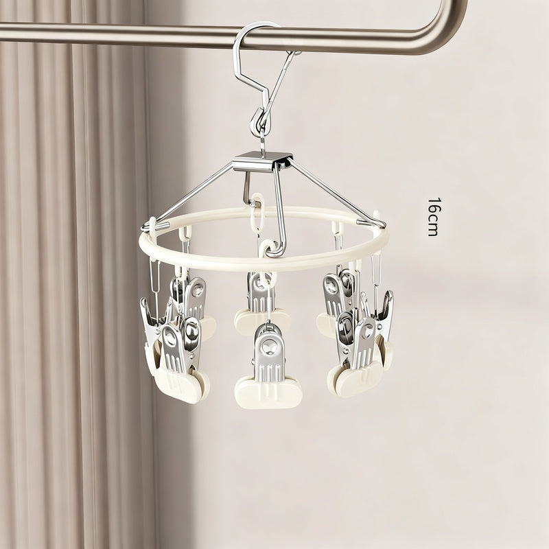 Clothes drying rack with clips