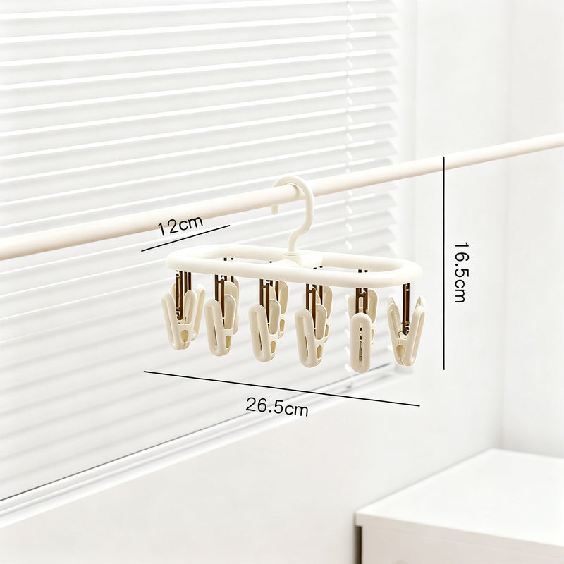 Clothes drying rack with multiple clips for hanging