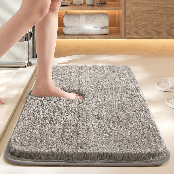 Bathroom mat with slip protection and water storage