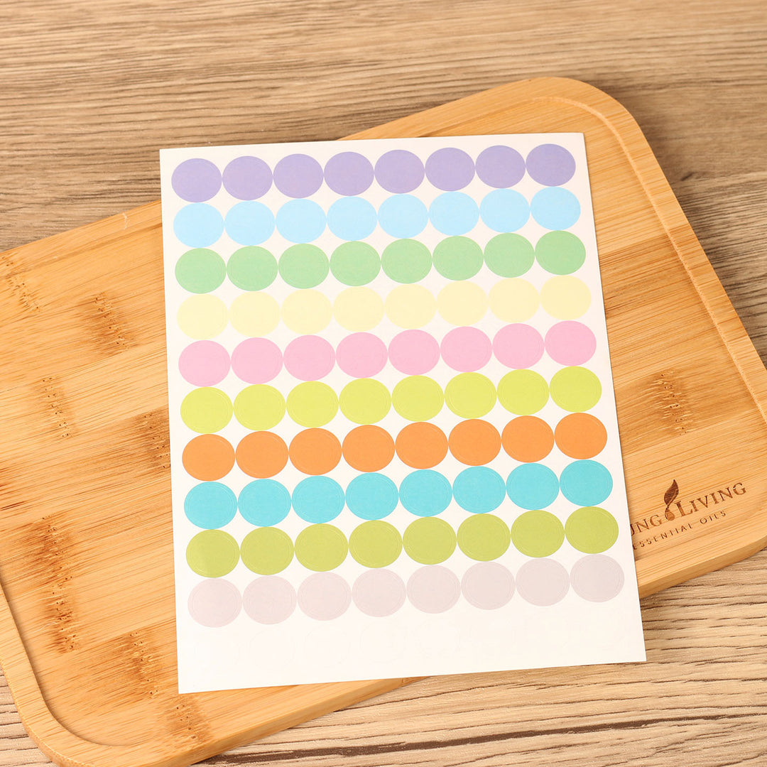Round labels for bottles, self-adhesive