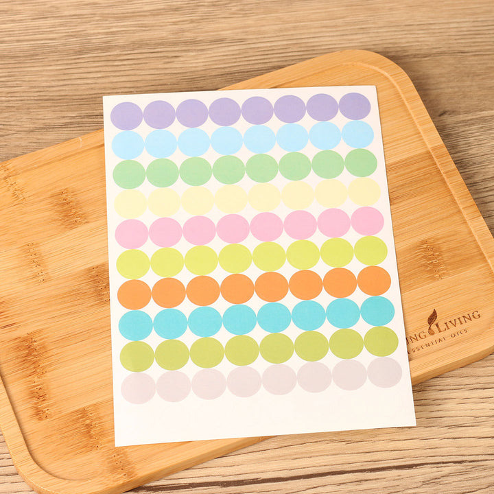 Round labels for bottles, self-adhesive