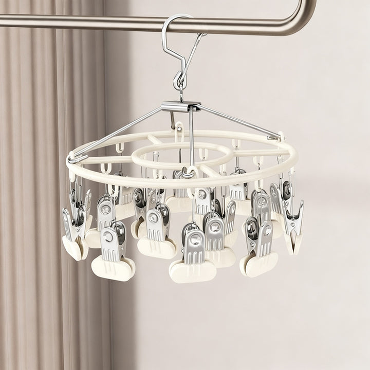 Clothes drying rack with clips