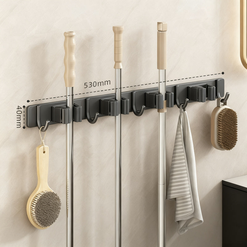 Wall bracket for brooms and mops made of stainless steel