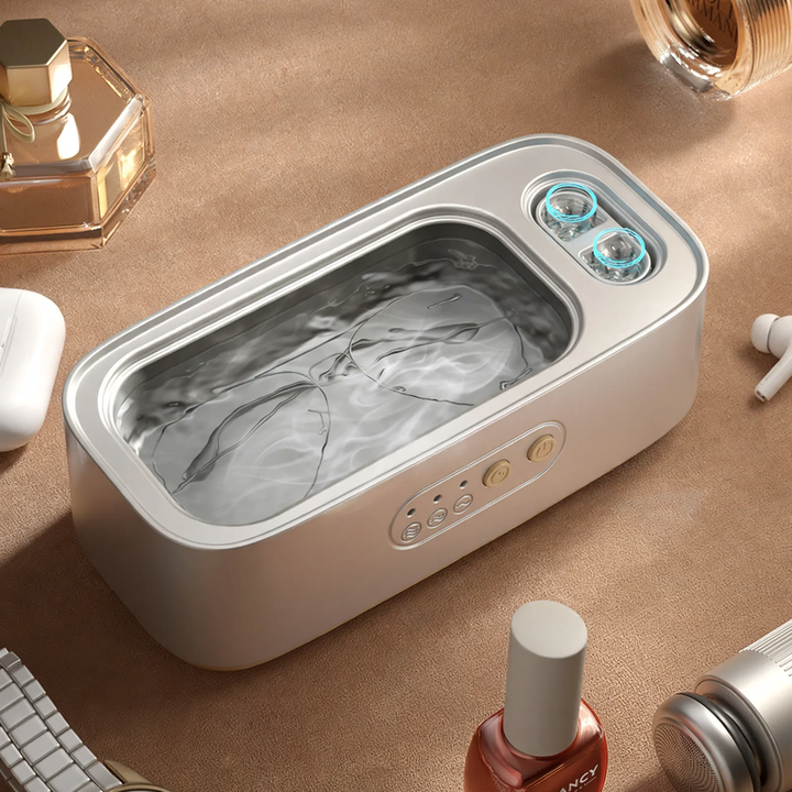 Ultrasonic eyeglass cleaner with double chamber
