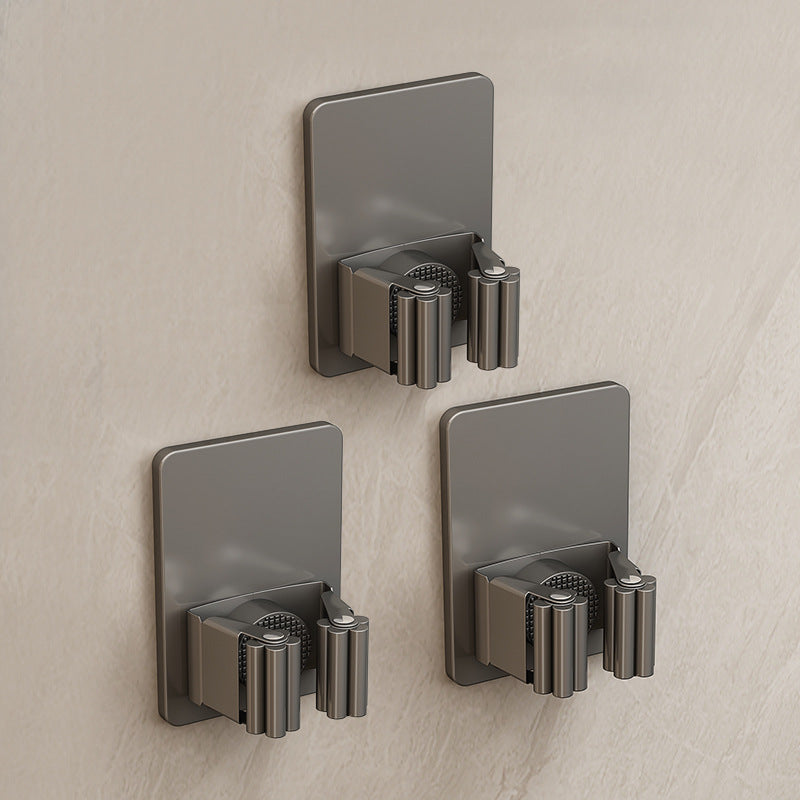 Stainless steel holder for mop and broom