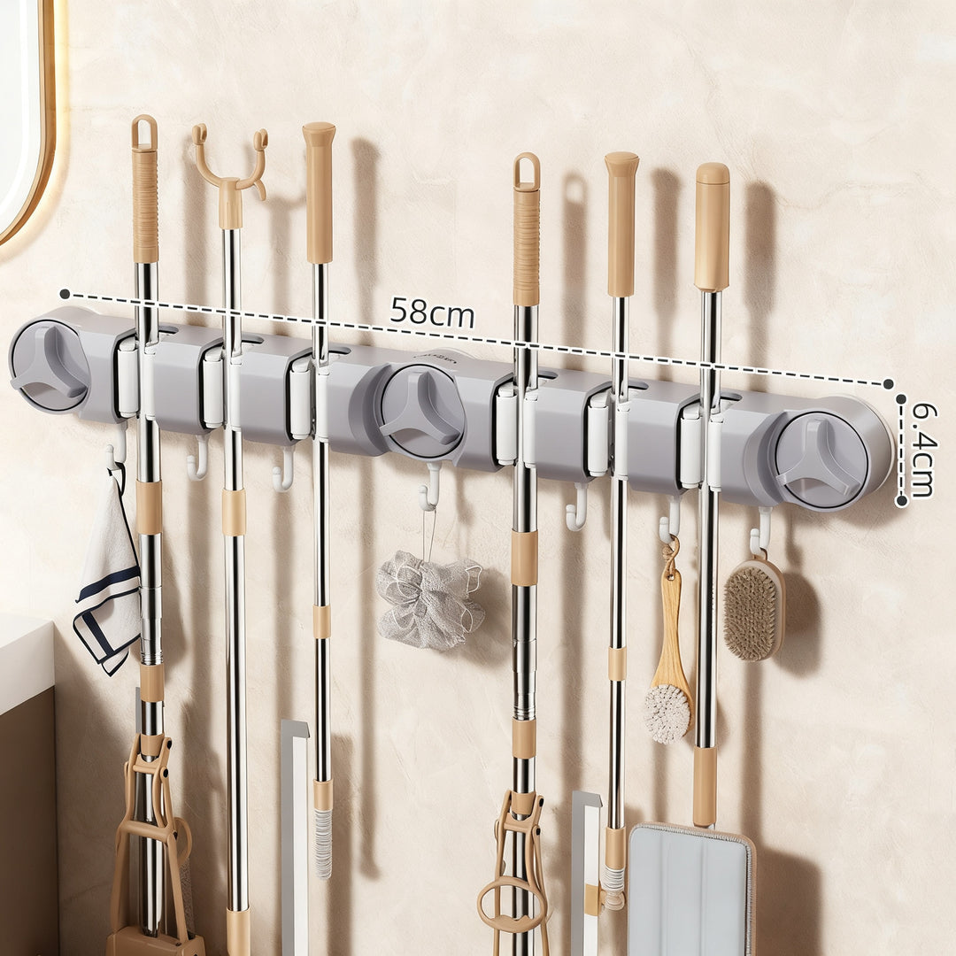 Suction cup holder for broom and mop