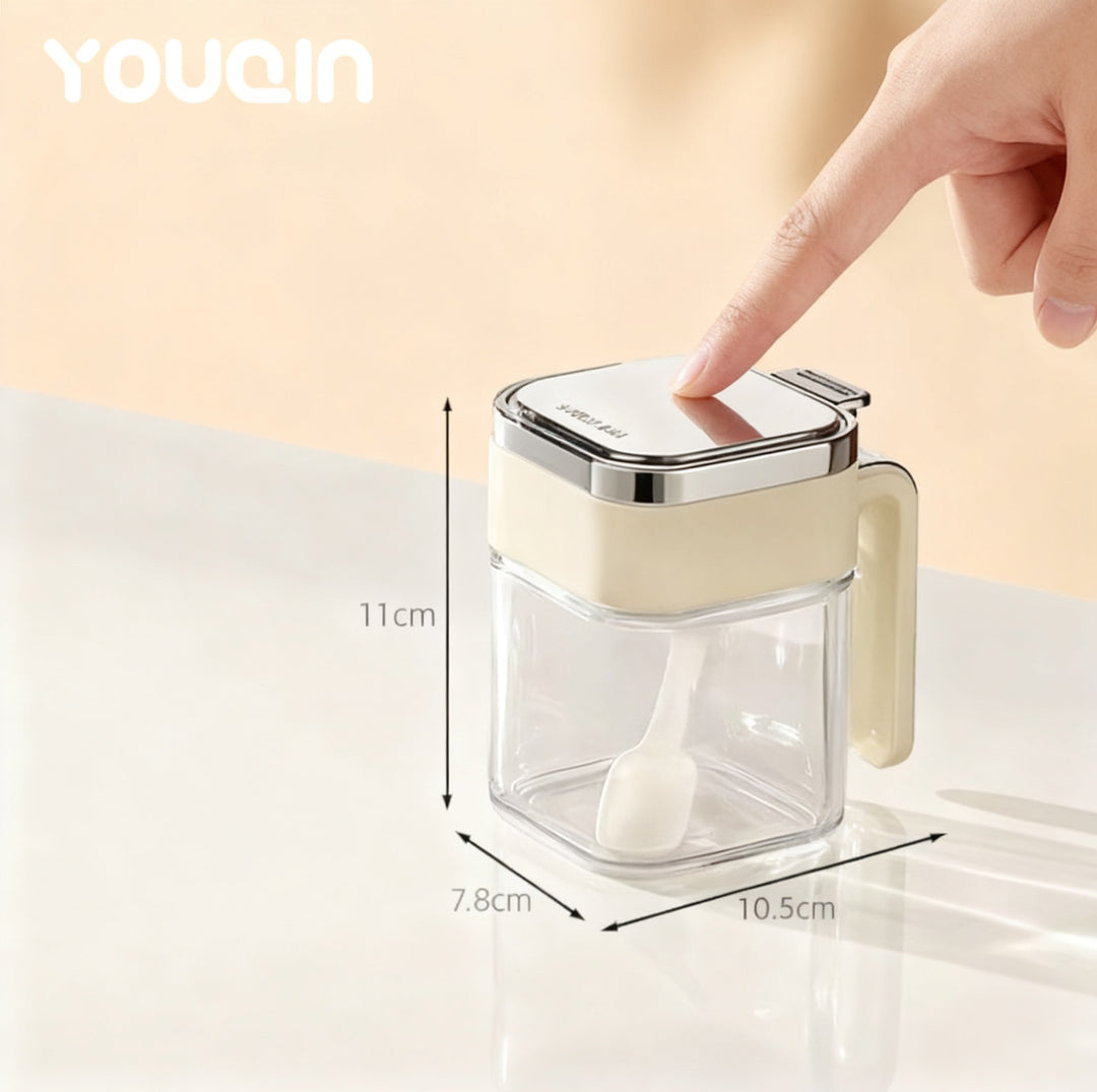 Glass oil can with automatic closure