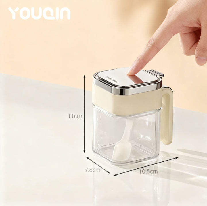 Glass oil can with automatic closure