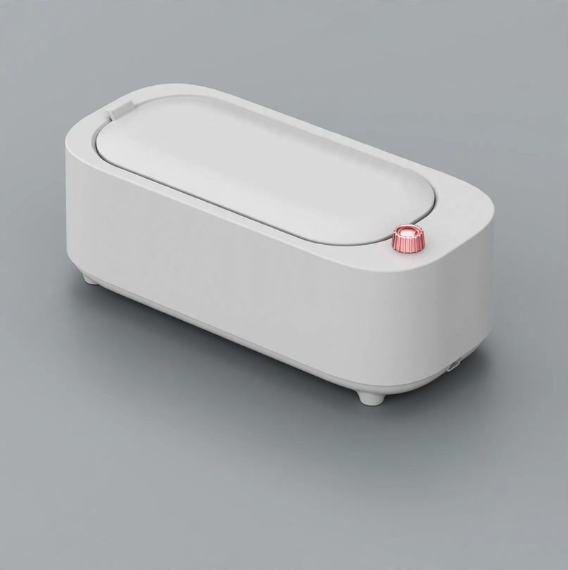 Double chamber ultrasonic cleaning device