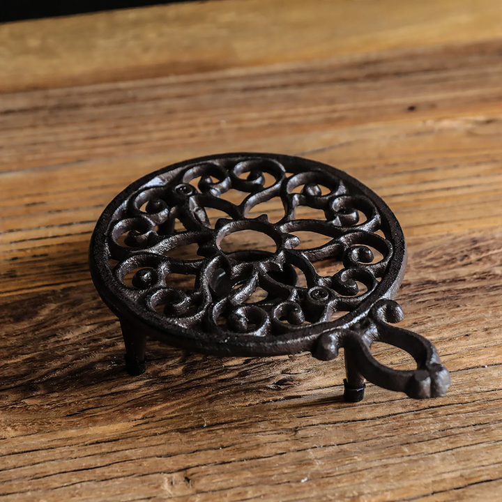 Cast iron tea warmer with burner stand
