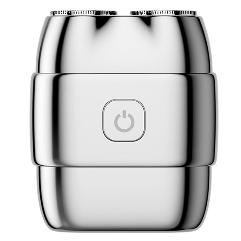 Portable electric razor with double blade ring