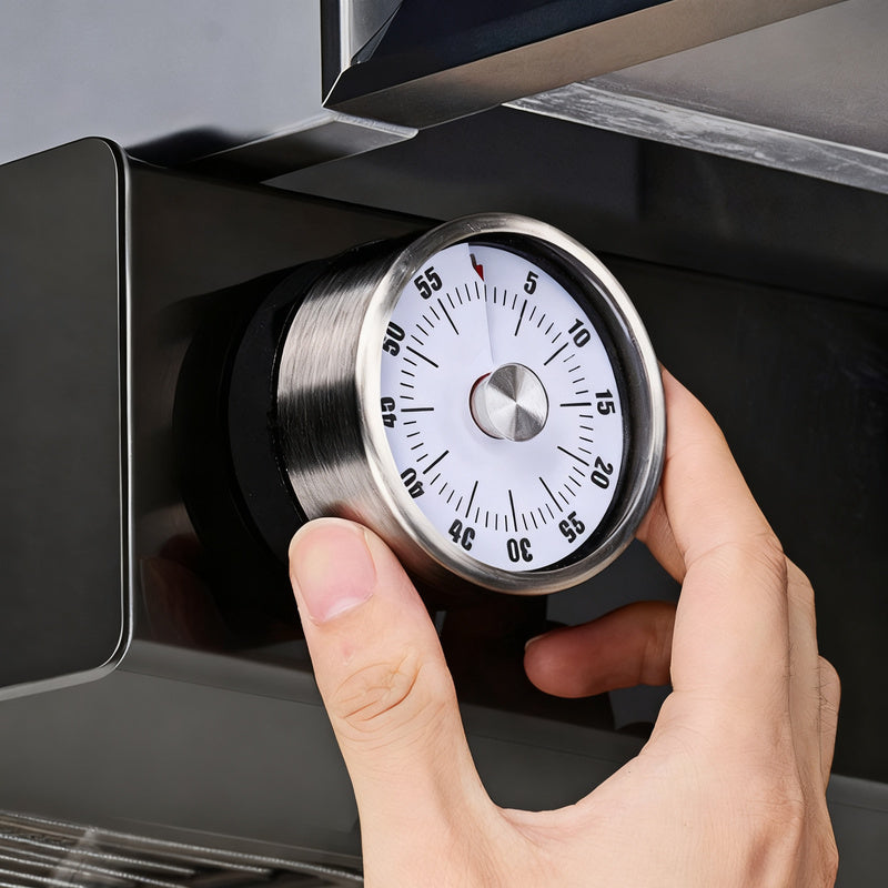 Mechanical kitchen timer with magnet holder