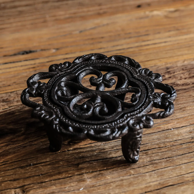 Cast iron tea warmer with burner stand