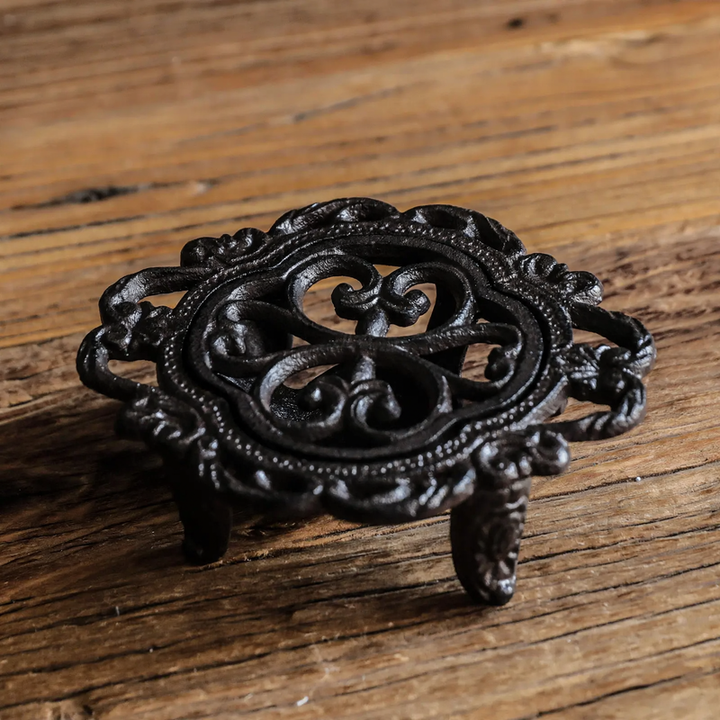 Cast iron tea warmer with burner stand