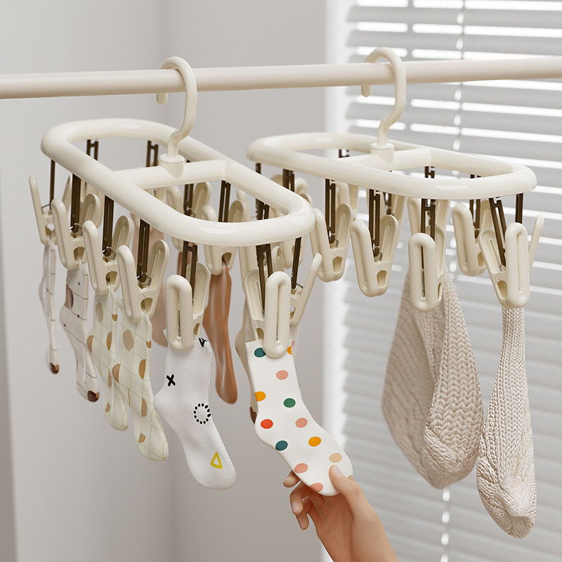 Clothes drying rack with multiple clips for hanging