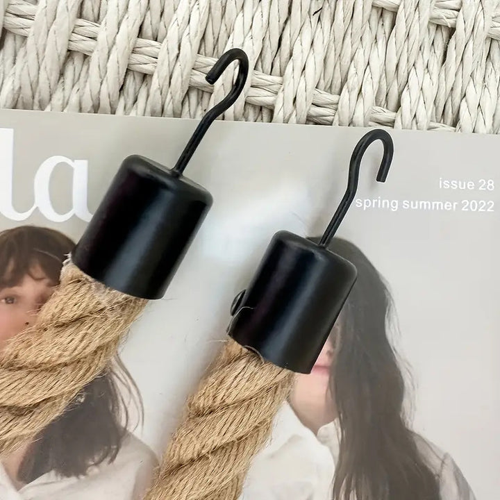 Toilet paper holder with rope and metal hook