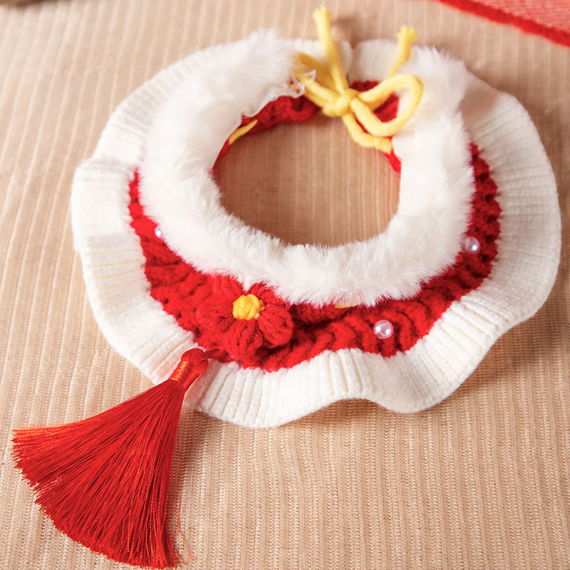 Knitted pet bandana with festive patterns
