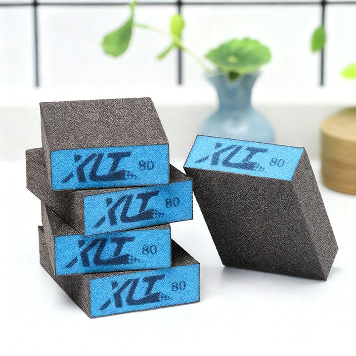Abrasive sponge with grain for pots and pans