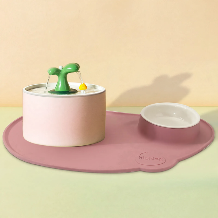 Heated ceramic drinking fountain for pets