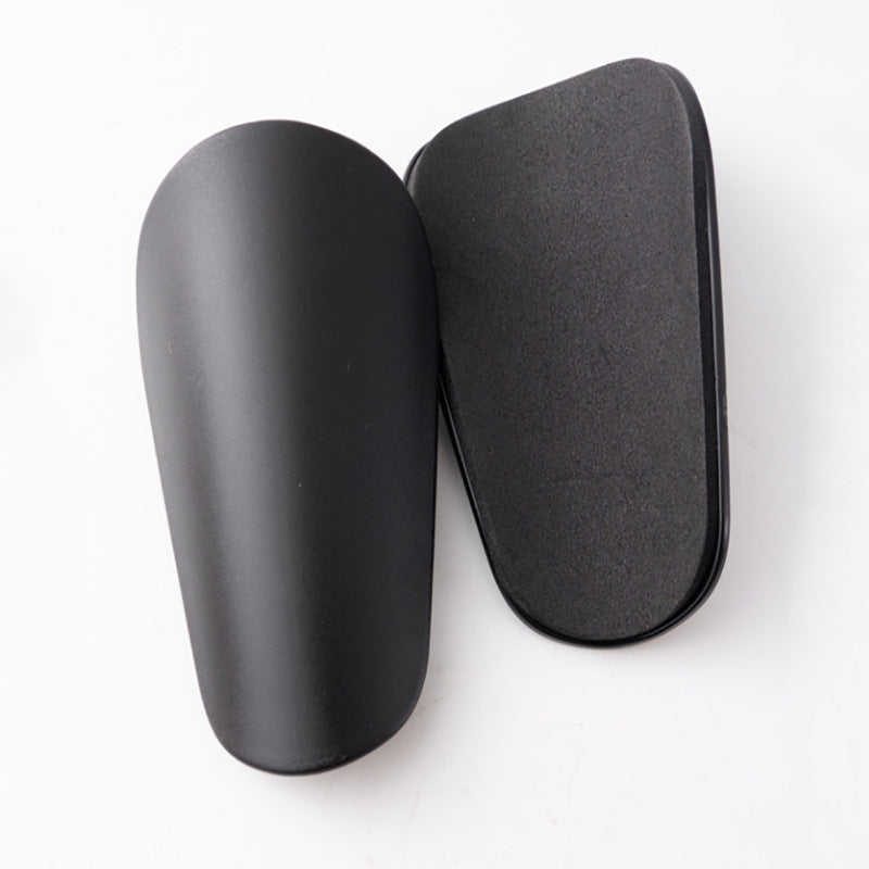 Plastic shin guards for ball sports