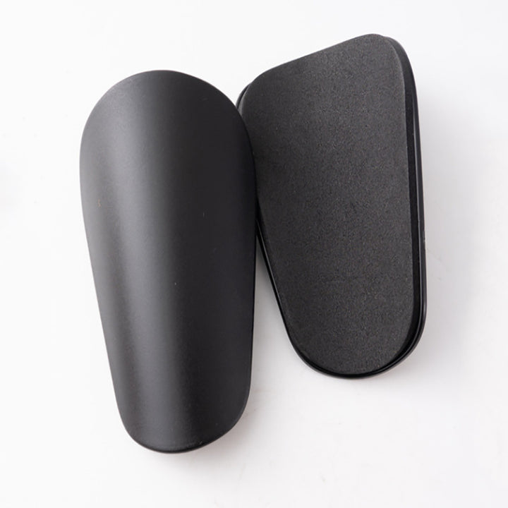 Plastic shin guards for ball sports