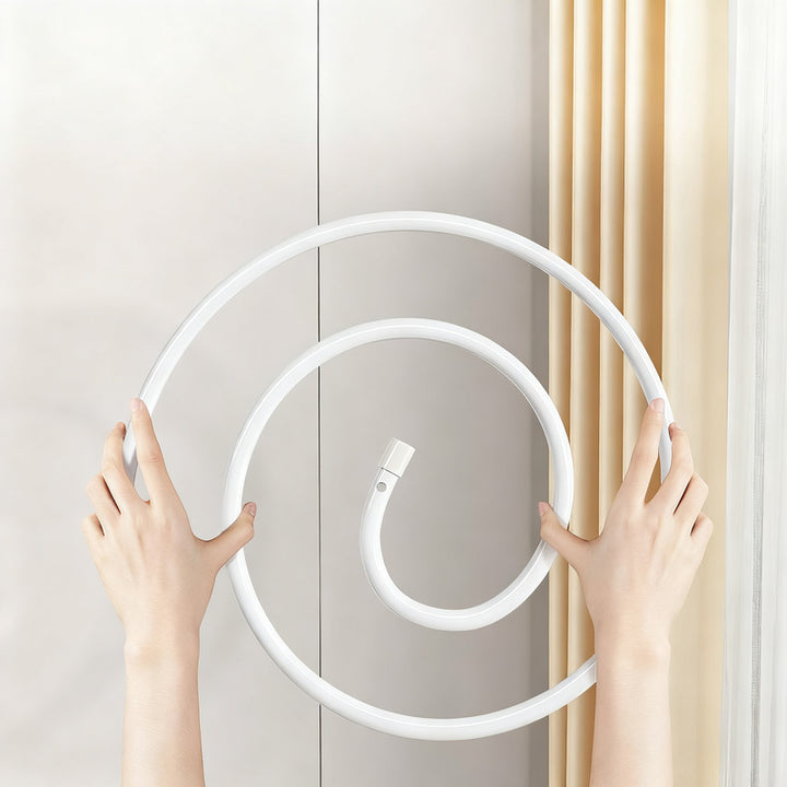 Clothes dryer spiral-shaped, round or oval