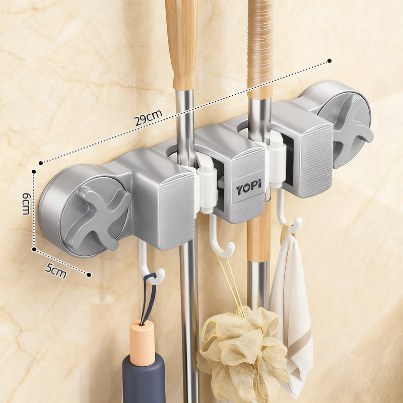 Suction cup holder for broom and mop