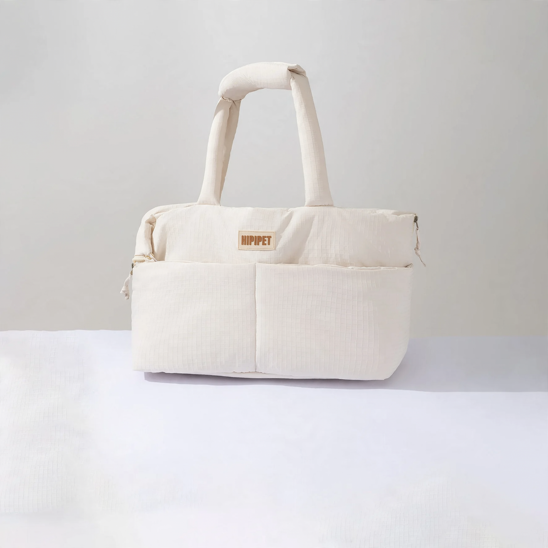Portable pet carrier with sleeping mat