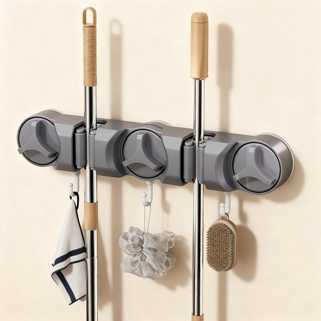 Suction cup holder for broom and mop