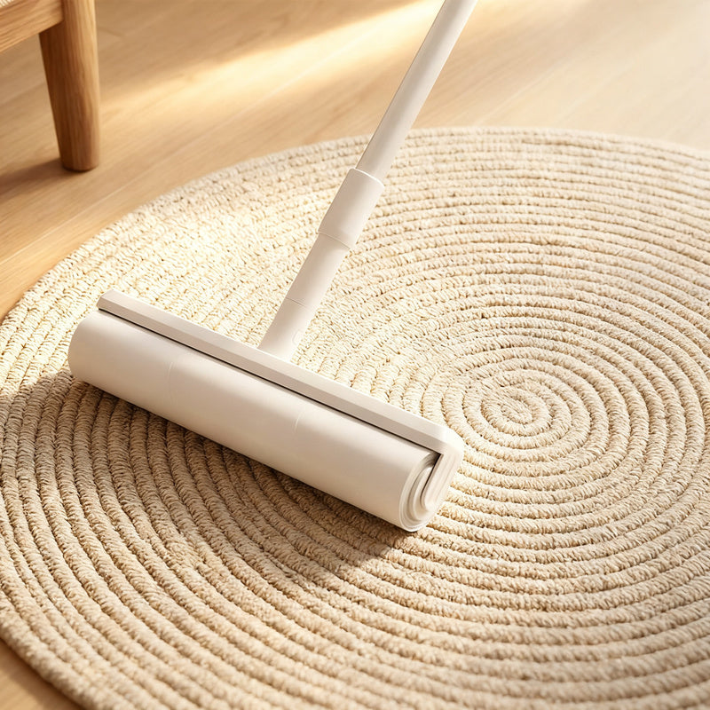 Lint roller with extendable handle