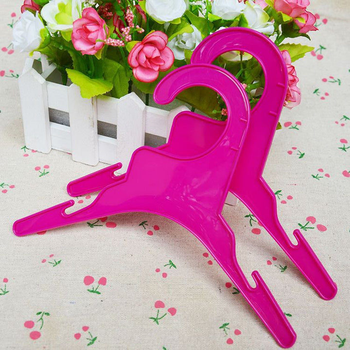 Plastic hanger for pet clothing